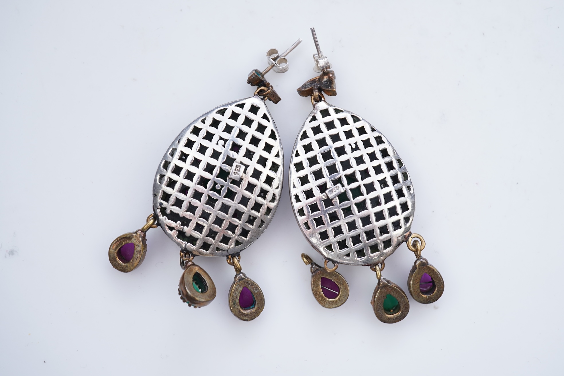 A pair of gem-set and diamond earrings